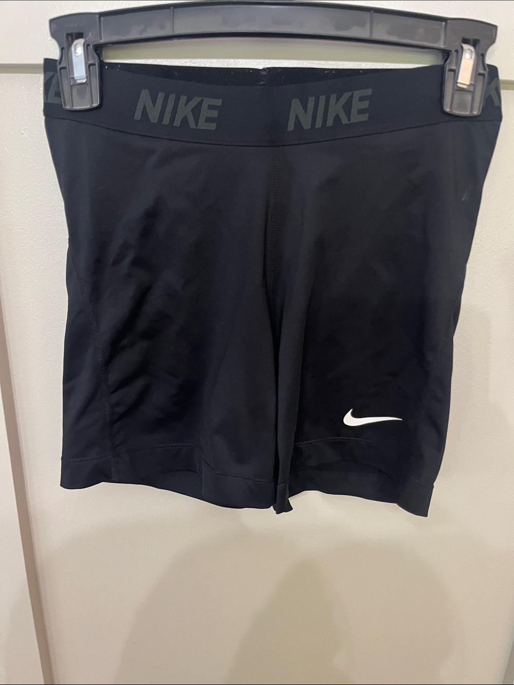Nike Black Athletic Compression Shorts with White Swoosh